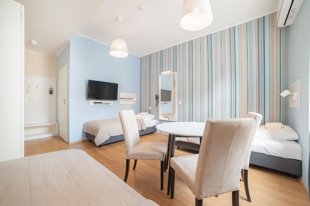 Posteľ alebo postele v izbe v ubytovaní Hotel Traffic Wrocław Stare Miasto