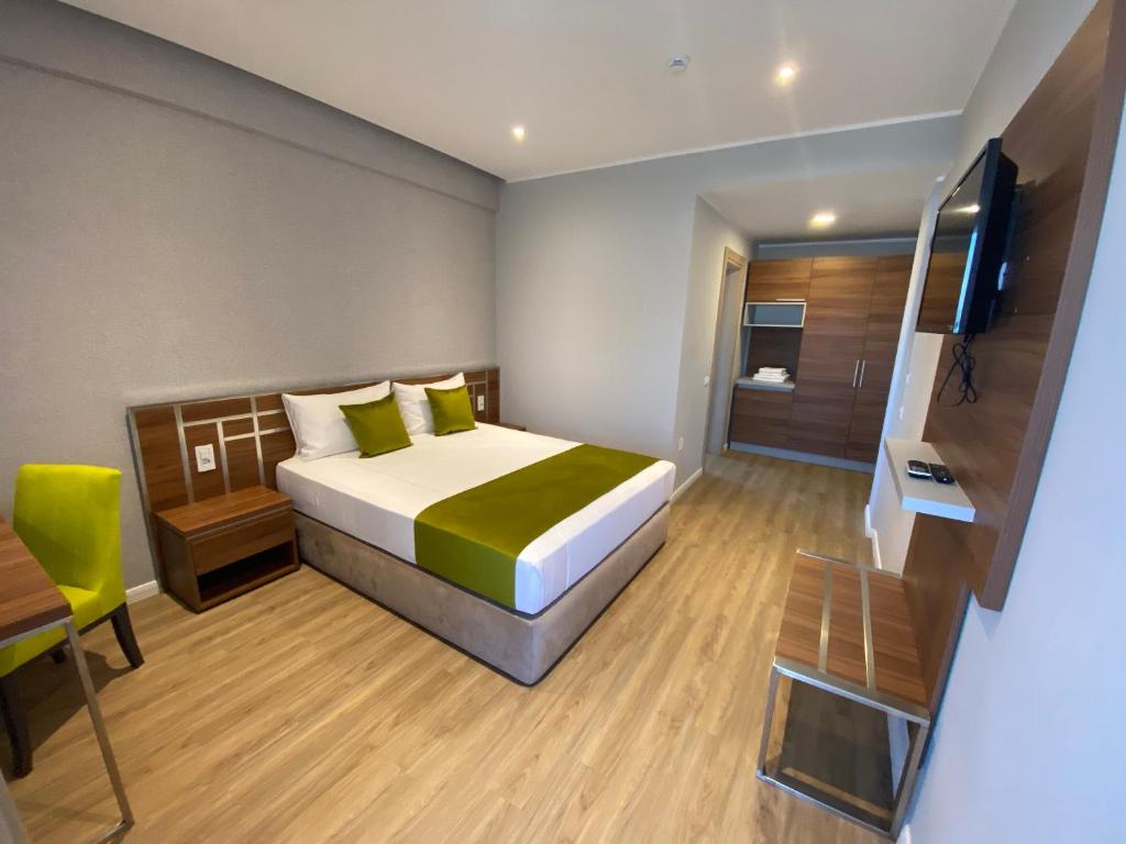 Postel nebo postele na pokoji v ubytování Hotel Rhodos