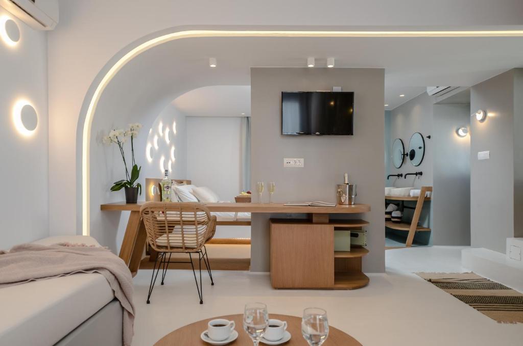 TV a/nebo společenská místnost v ubytování Argo Boutique Hotel