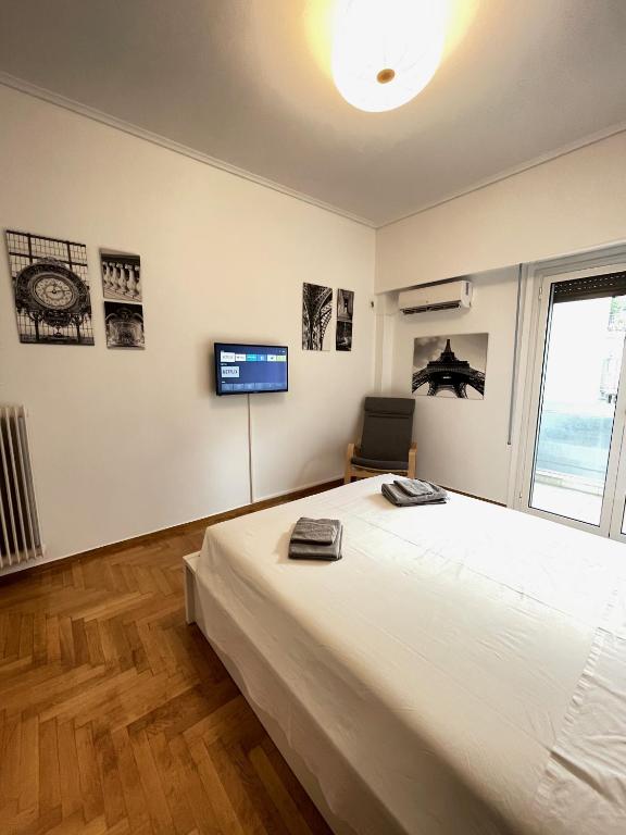 Posteľ alebo postele v izbe v ubytovaní Olympic Hadrian Apartment next to Acropolis