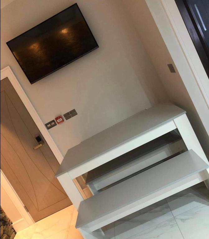 TV a/nebo společenská místnost v ubytování Lisvarna House