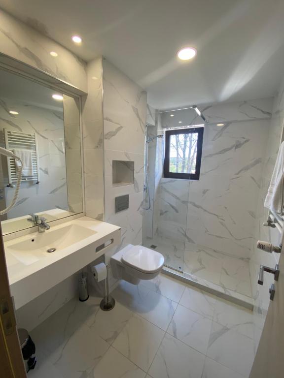 Koupelna v ubytování Hotel Rhodos