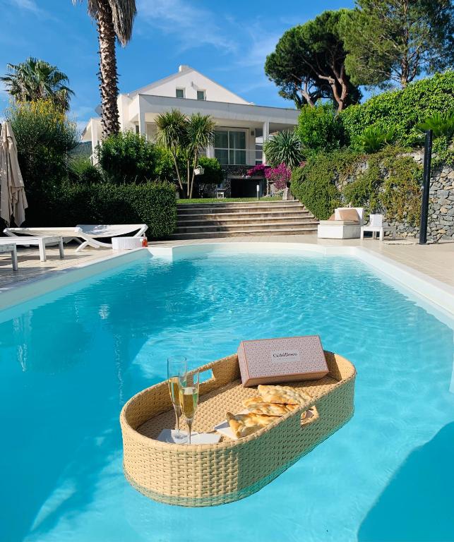 The swimming pool at or close to White Dream Spotorno