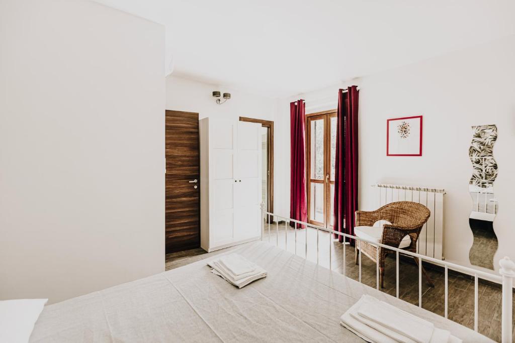 Postel nebo postele na pokoji v ubytování B&b La Cicala