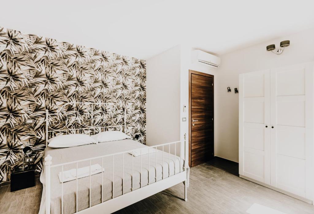 Postel nebo postele na pokoji v ubytování B&b La Cicala
