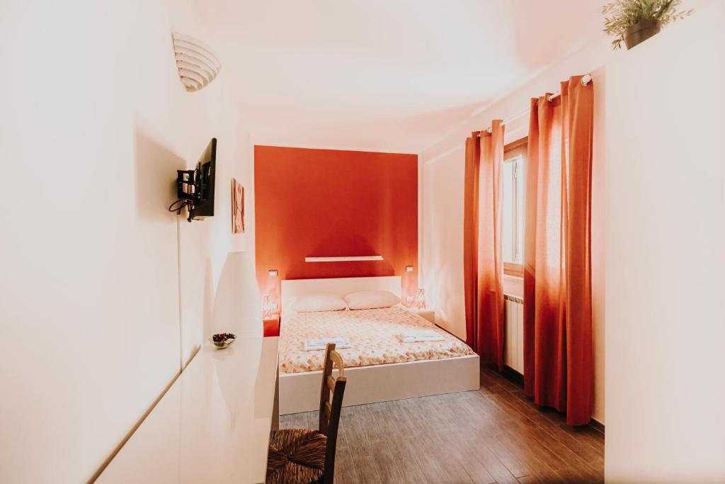 Postel nebo postele na pokoji v ubytování B&b La Cicala