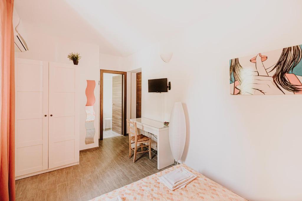 TV a/nebo společenská místnost v ubytování B&b La Cicala