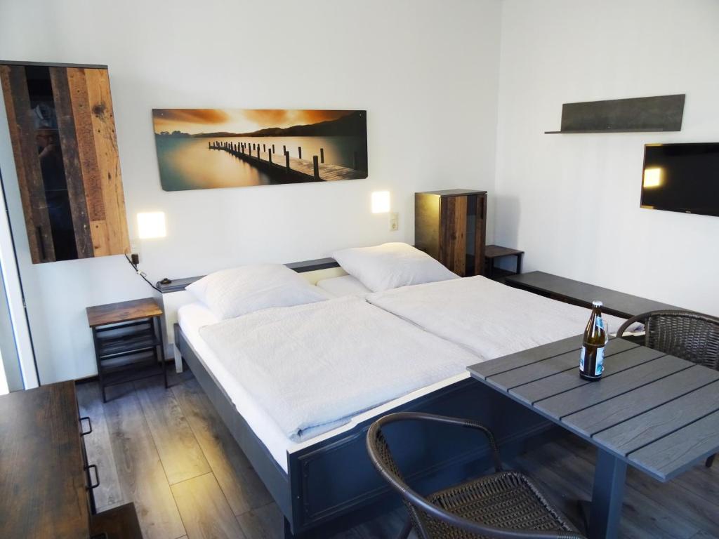 Postel nebo postele na pokoji v ubytování Eventhotel Ö - Cappuccino