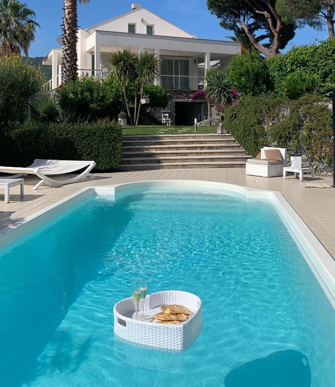 The swimming pool at or close to White Dream Spotorno