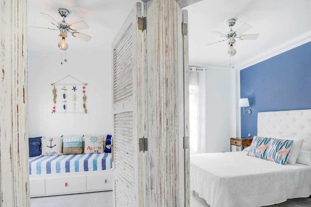 Postel nebo postele na pokoji v ubytování Villa Nora Beach