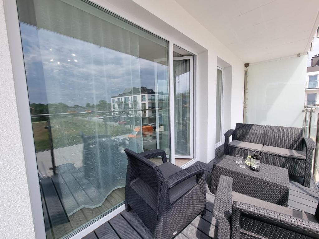 Posedenie v ubytovaní Apartamenty Na Fali w Gąskach - 365PAM