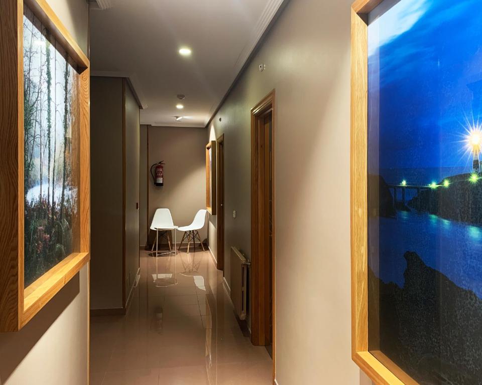 Postel nebo postele na pokoji v ubytování Hotel Bello