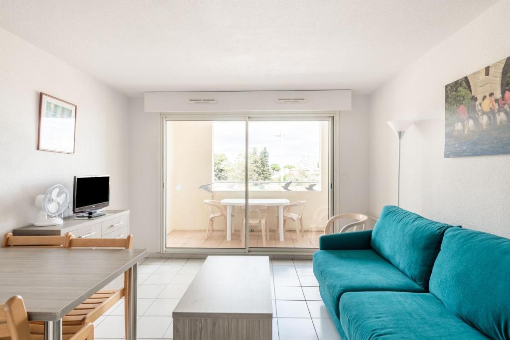 TV a/nebo společenská místnost v ubytování Residence Residhotel Mayflower