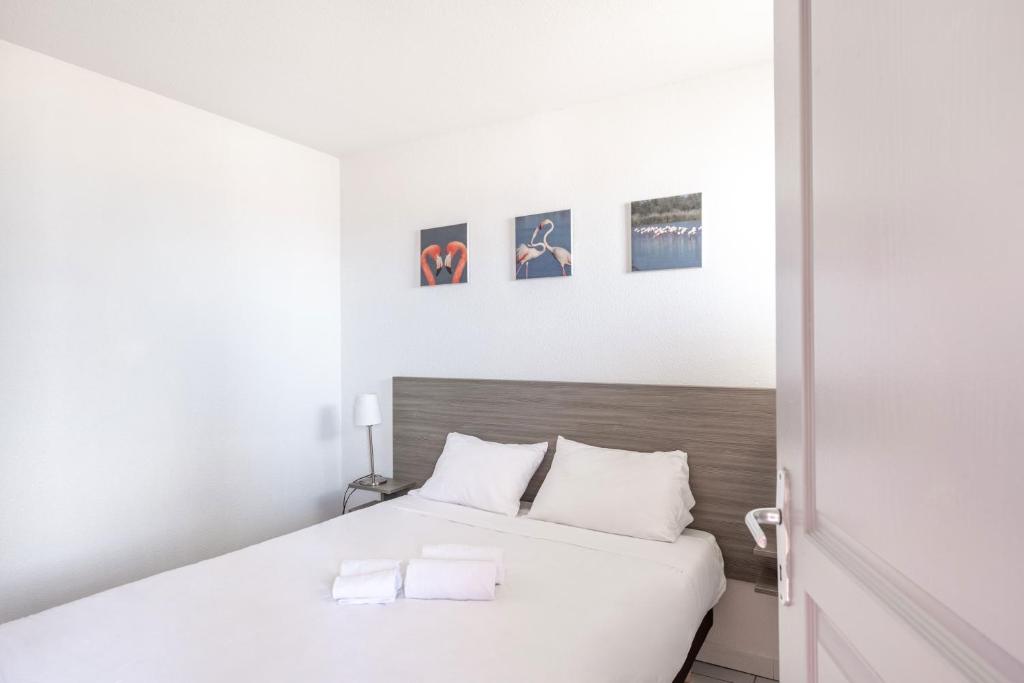 Postel nebo postele na pokoji v ubytování Residence Residhotel Mayflower