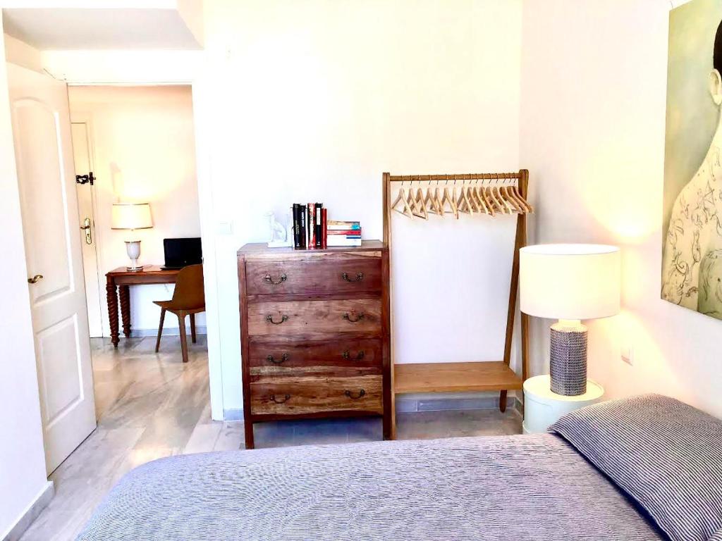 A bed or beds in a room at Inspiring Apartment in Carihuela Beach