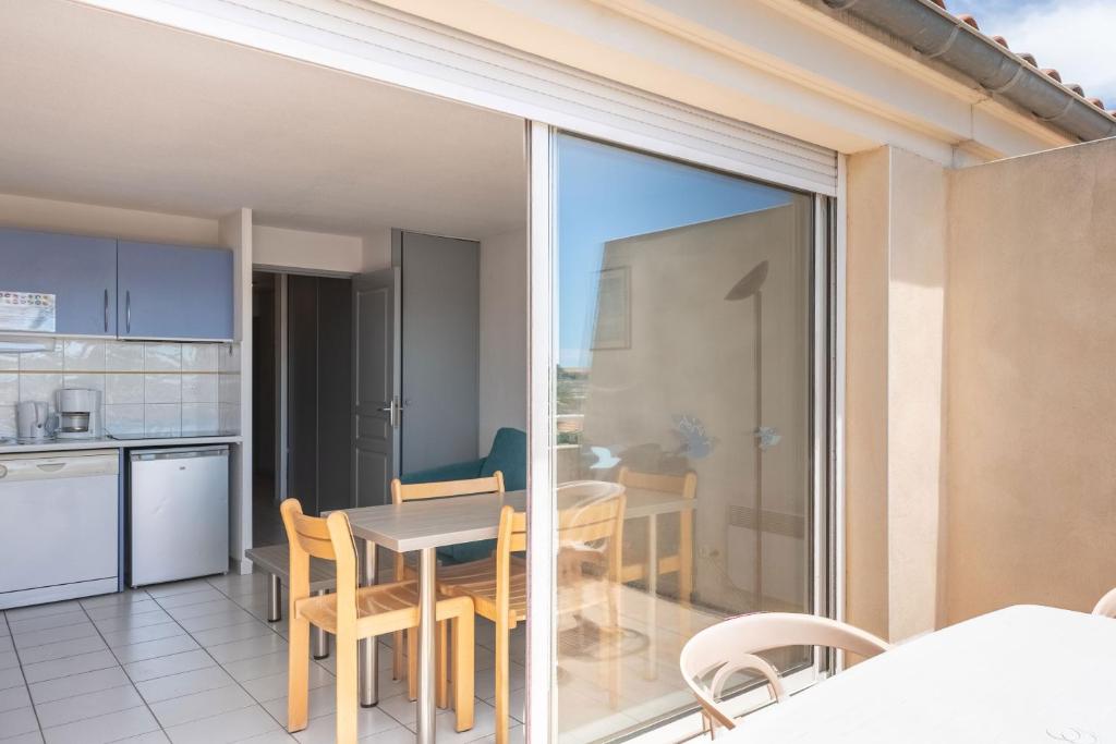 Kuchyň nebo kuchyňský kout v ubytování Residence Residhotel Mayflower