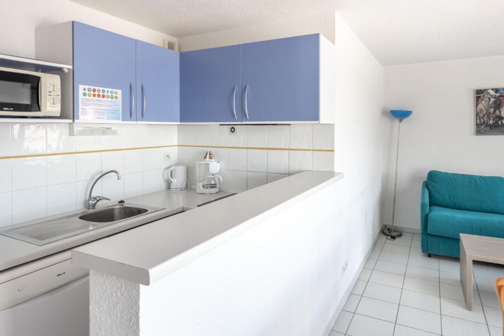 Kuchyň nebo kuchyňský kout v ubytování Residence Residhotel Mayflower