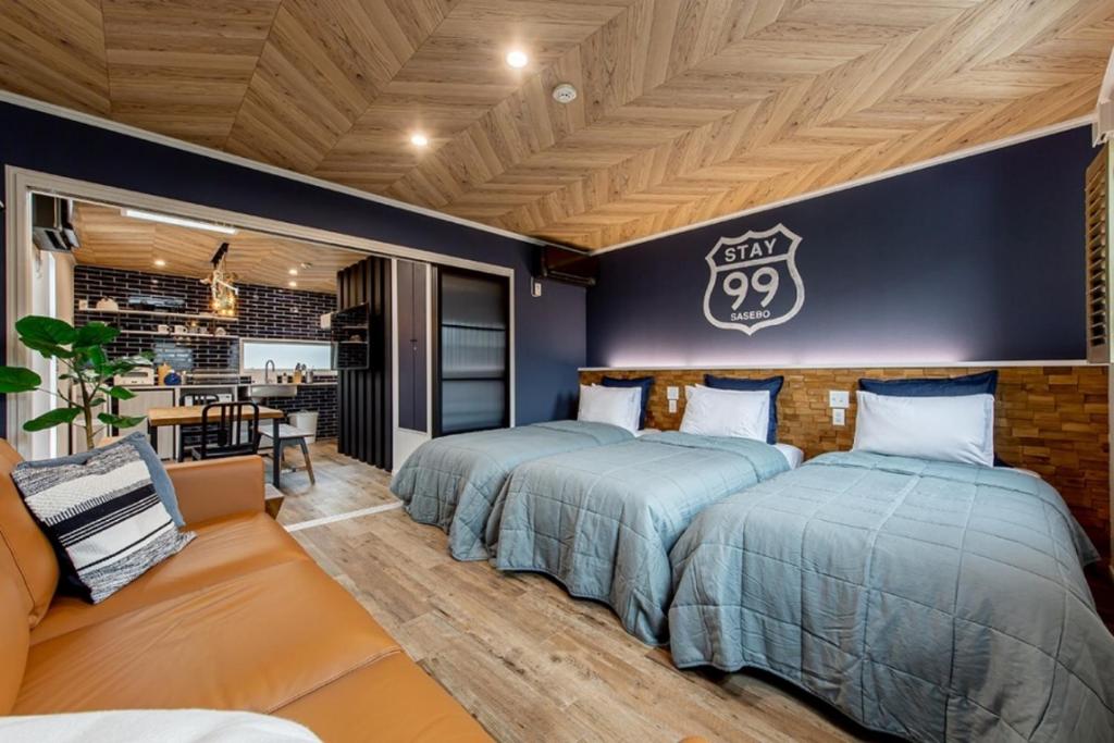 Кровать или кровати в номере 99Stay Sasebo SGx