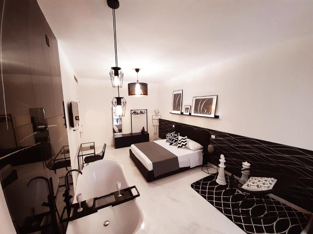 TV a/nebo společenská místnost v ubytování B&B Secret Suite