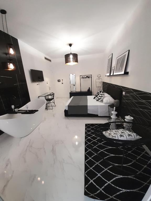 TV a/nebo společenská místnost v ubytování B&B Secret Suite