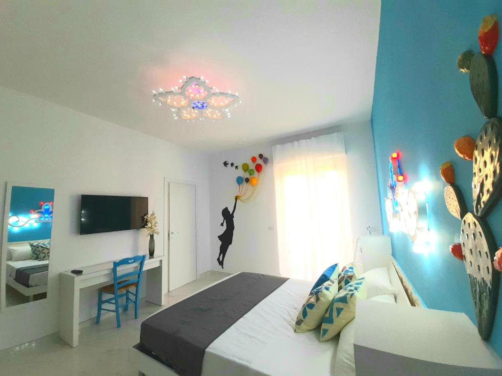 Postel nebo postele na pokoji v ubytování B&B Secret Suite