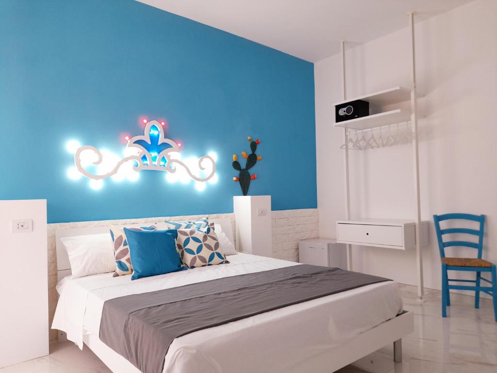 Postel nebo postele na pokoji v ubytování B&B Secret Suite