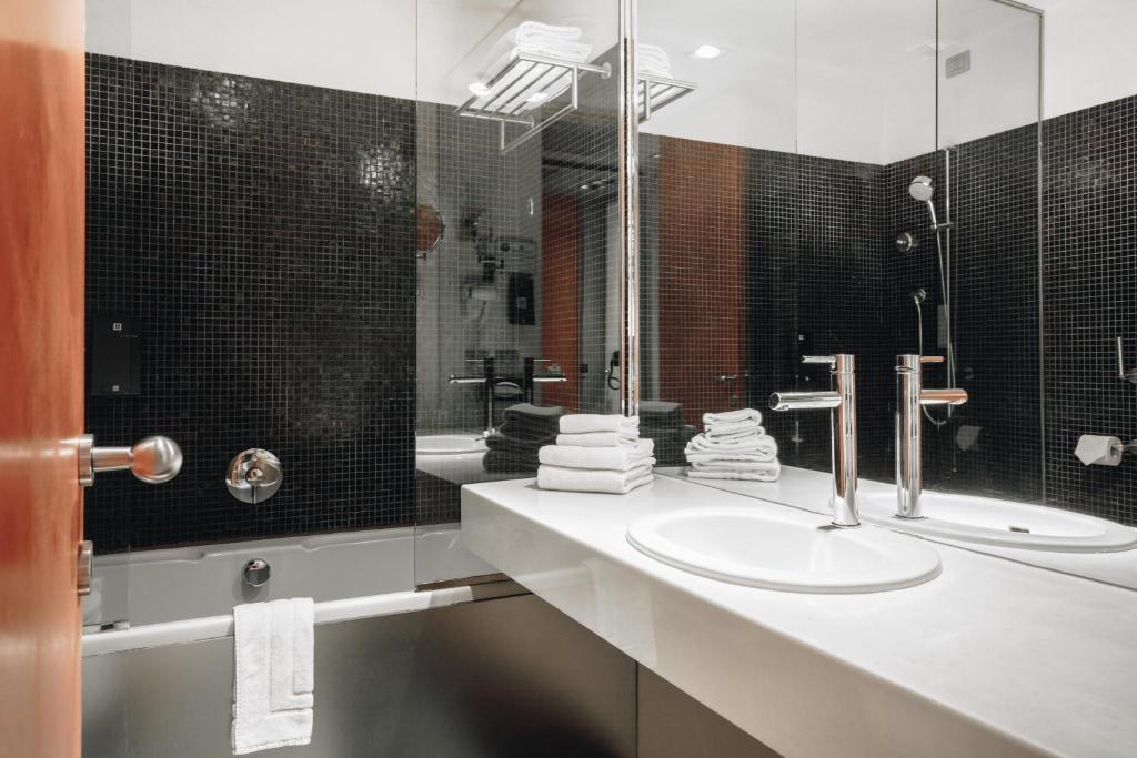 Koupelna v ubytování DelleArti Design Hotel