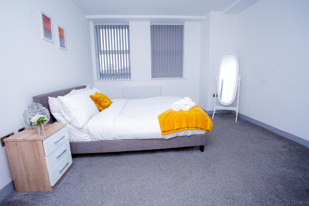 Krevet ili kreveti u jedinici u objektu Cosy Executive City Apartment