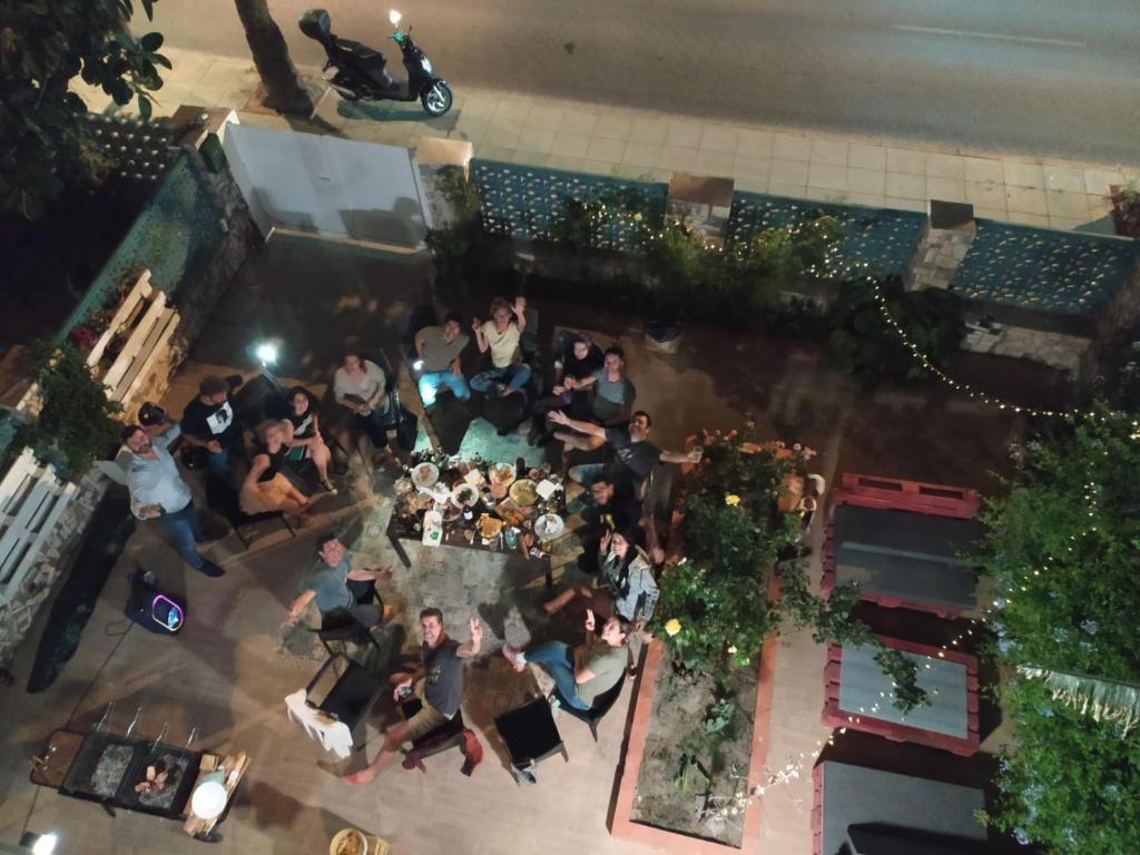 an overhead view of a group of people in a courtyard at LA PITA BEACH HOUSE in Almería