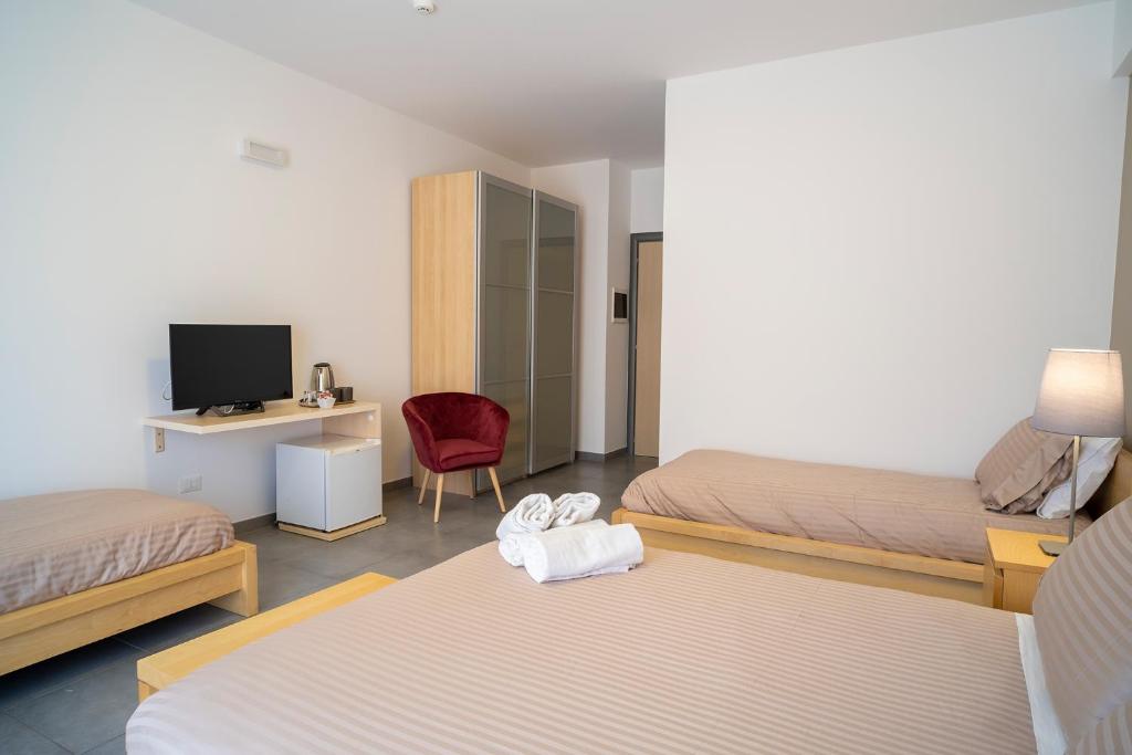 Enny Camere - Quadruple Chambre