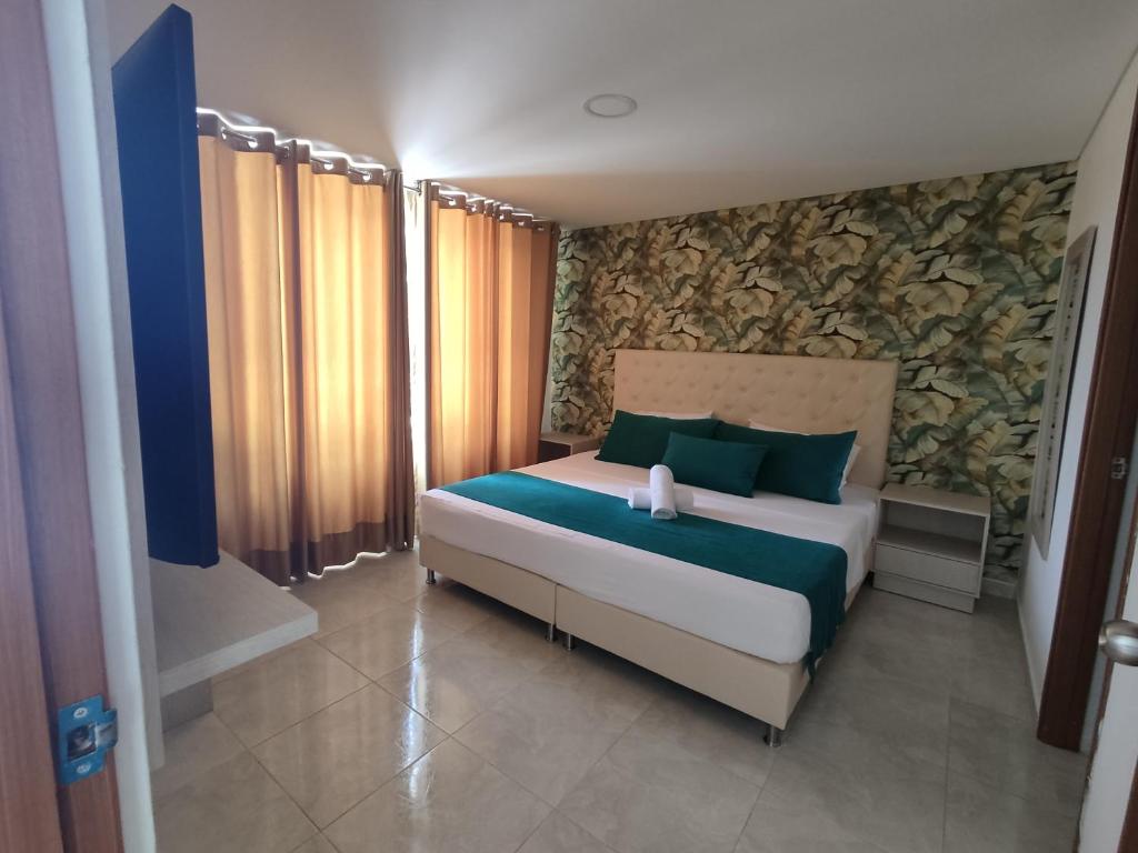 Postel nebo postele na pokoji v ubytování Hotel Aguas Abiertas