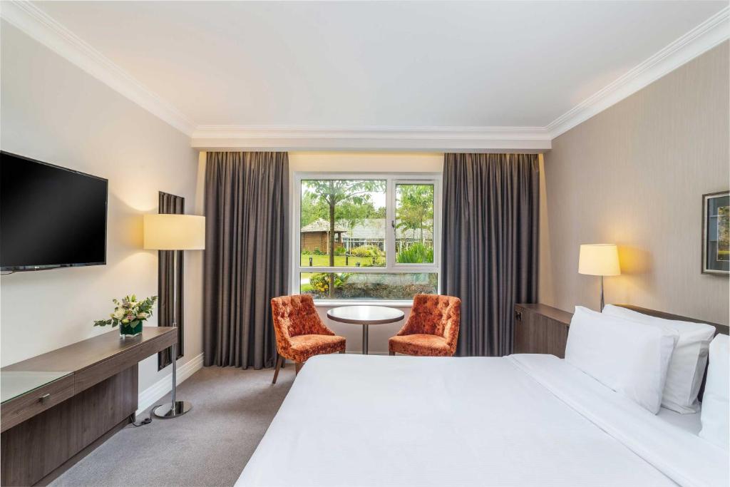 Postel nebo postele na pokoji v ubytování Hotel Kilmore