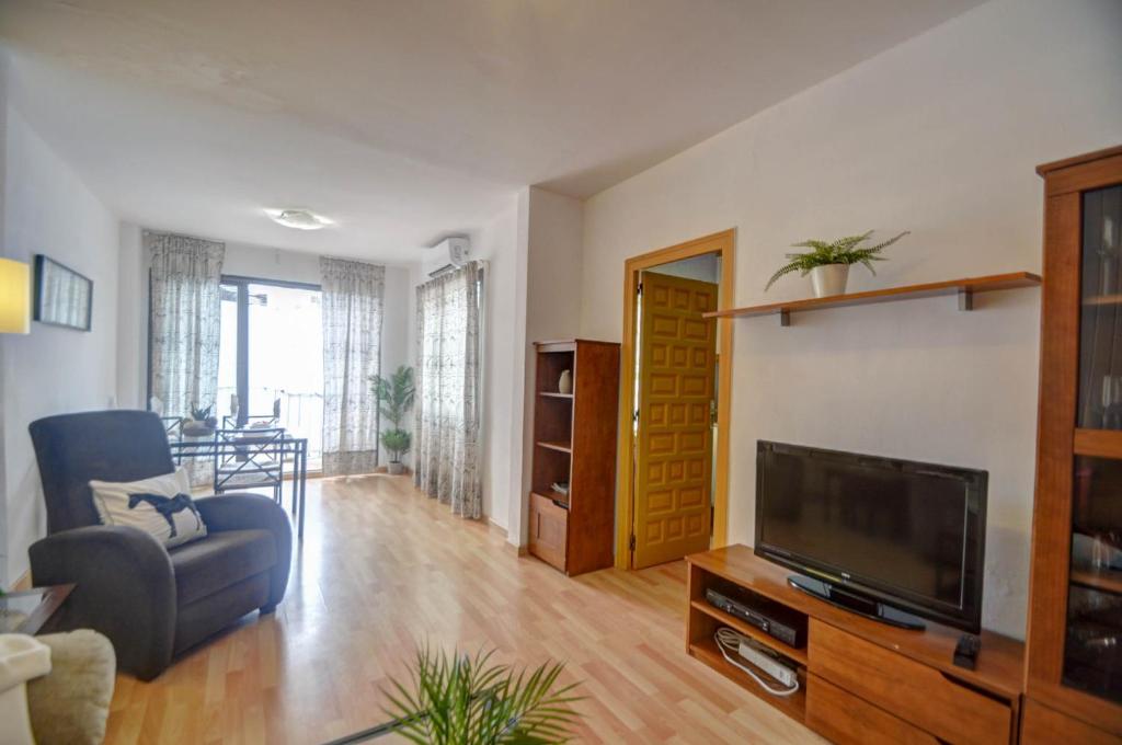 Televízia a/alebo spoločenská miestnosť v ubytovaní Sebastian Terrace Apartment by Hello Homes Sitges