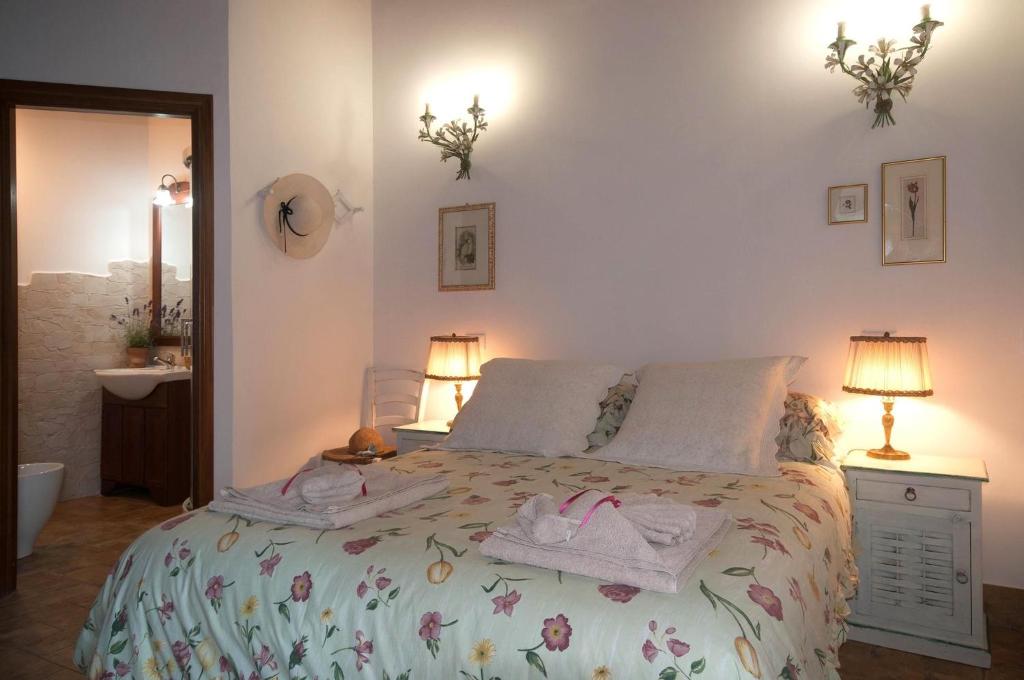 Posteľ alebo postele v izbe v ubytovaní B&B Etruscan Garden