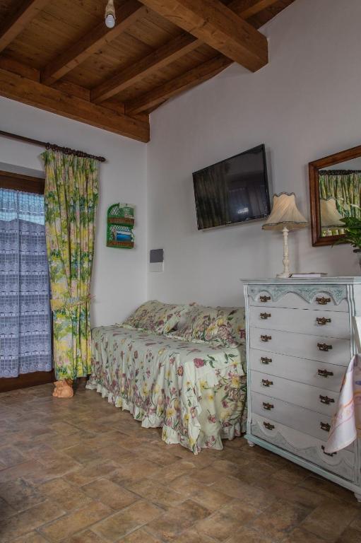 Posteľ alebo postele v izbe v ubytovaní B&B Etruscan Garden