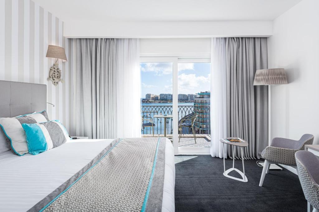 Postel nebo postele na pokoji v ubytování Hotel Juliani - Boutique Hotel