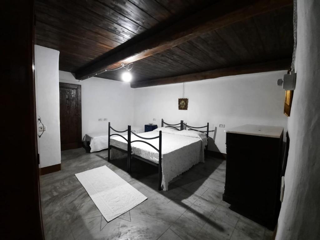 Postel nebo postele na pokoji v ubytování Domo Sedda