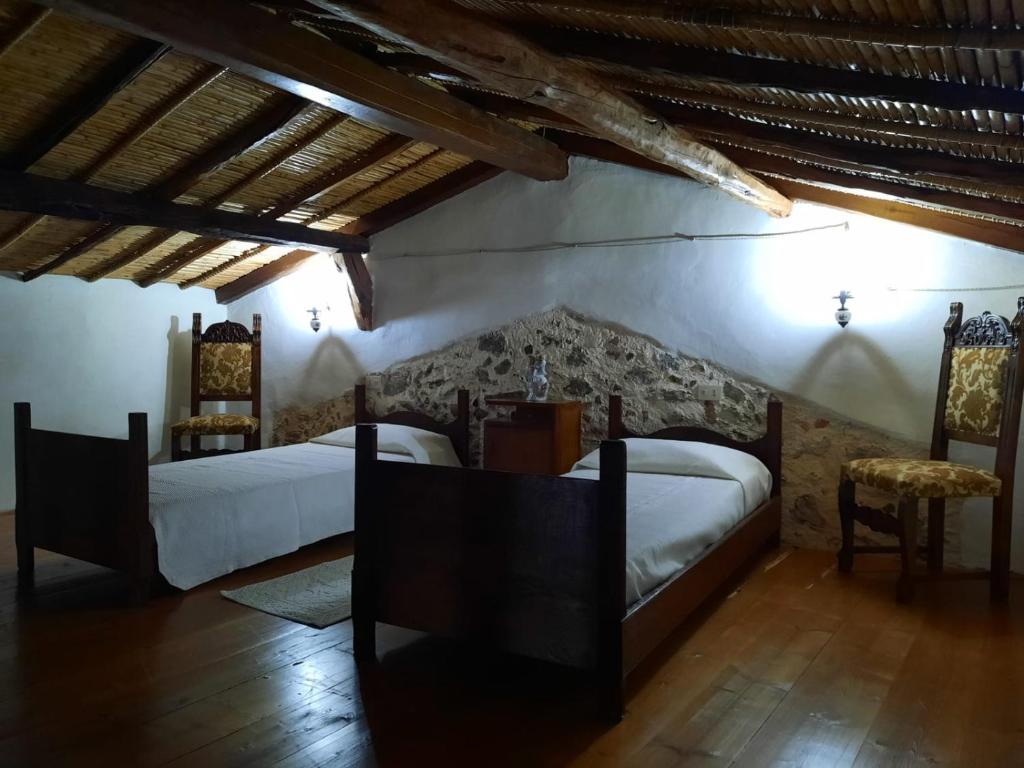 Uma cama ou camas num quarto em Domo Sedda