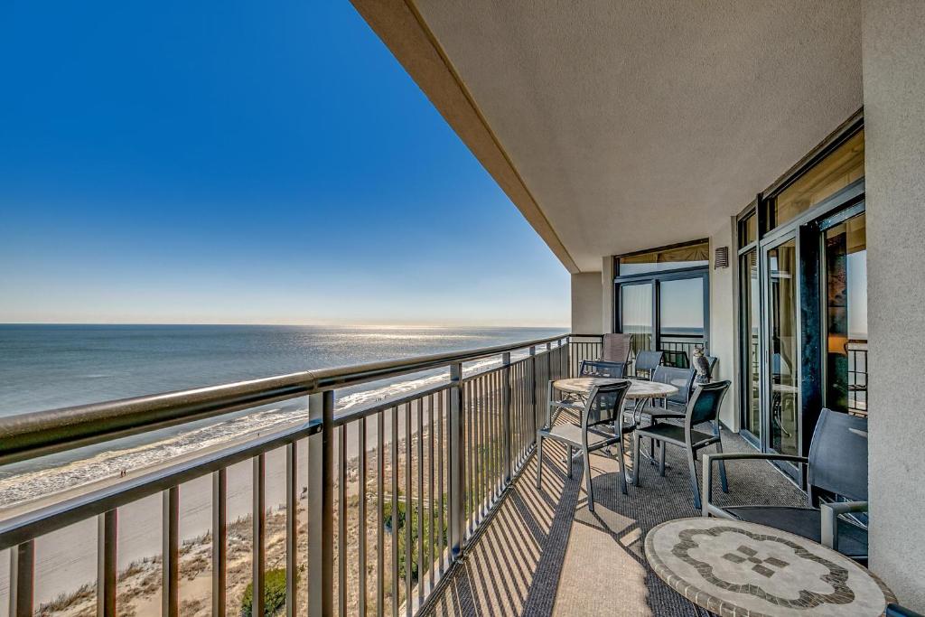 a balcony with a view of the beach at South Wind Penthouse 3 in Myrtle Beach