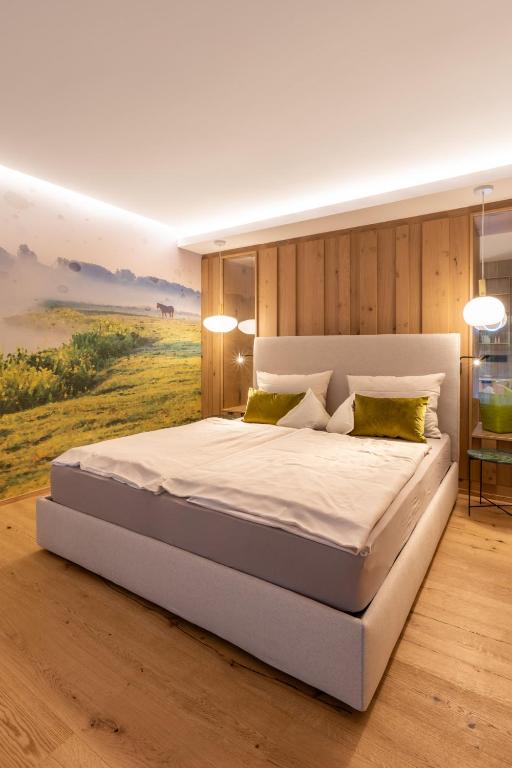 Postel nebo postele na pokoji v ubytování Sackmann Genuss und Spa Resort