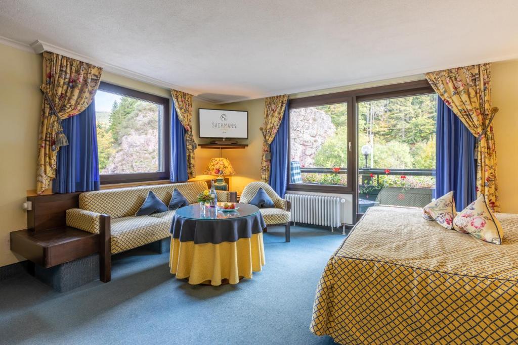 Postel nebo postele na pokoji v ubytování Sackmann Genuss und Spa Resort