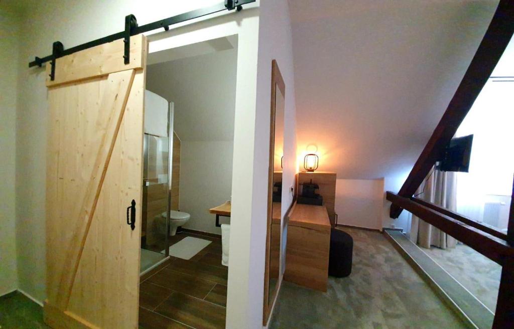 Koupelna v ubytování Hotel Le Filou