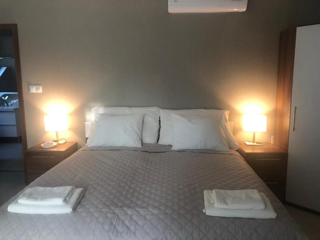 Posteľ alebo postele v izbe v ubytovaní Second Home Apartments Miskolctapolca