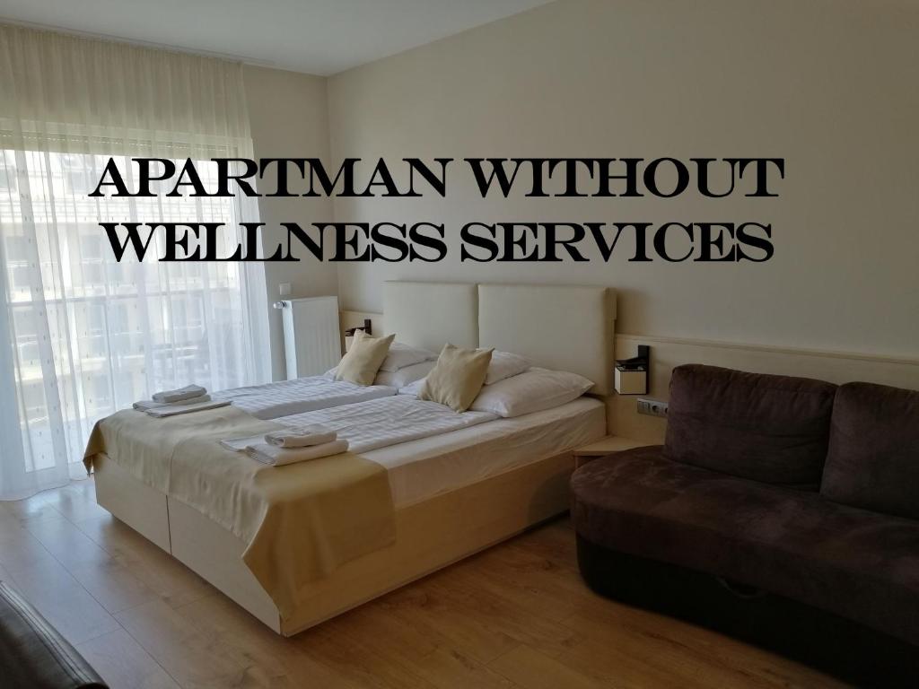 Postel nebo postele na pokoji v ubytování Wellness Apartments in Velence