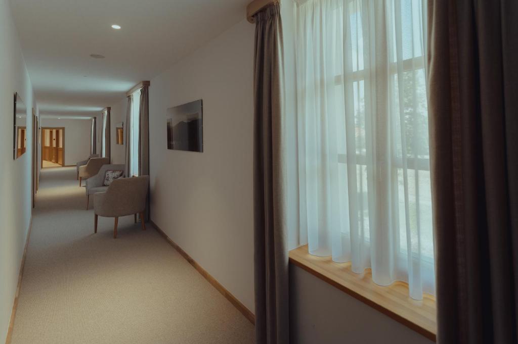 TV a/nebo společenská místnost v ubytování Brigadéros Hotel Brigadír Borsi