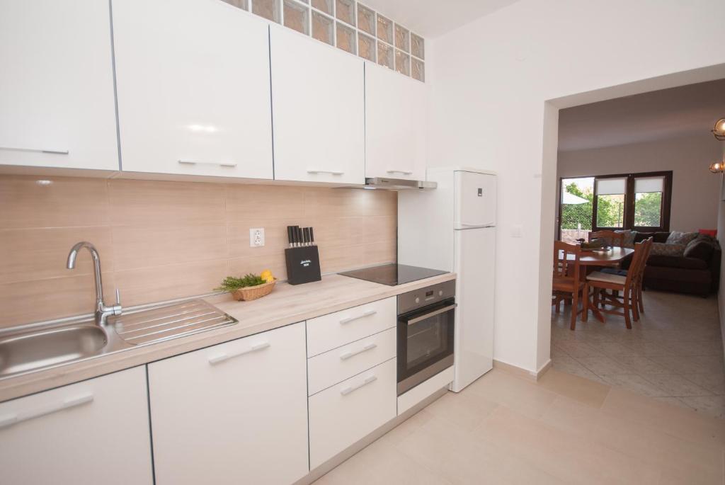 Kuchyň nebo kuchyňský kout v ubytování Apartments Dilk