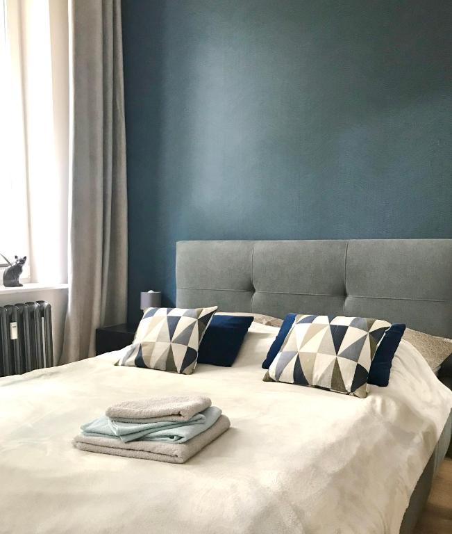 Posteľ alebo postele v izbe v ubytovaní Apartament Nad Jeziorem Czos