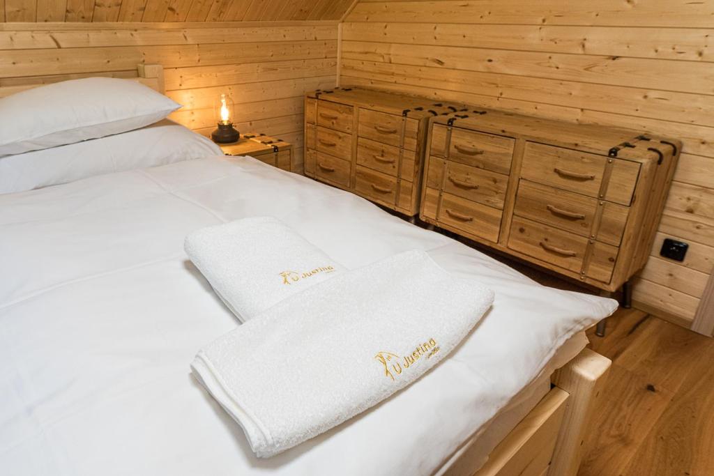 Postel nebo postele na pokoji v ubytování U Justina na potůčku
