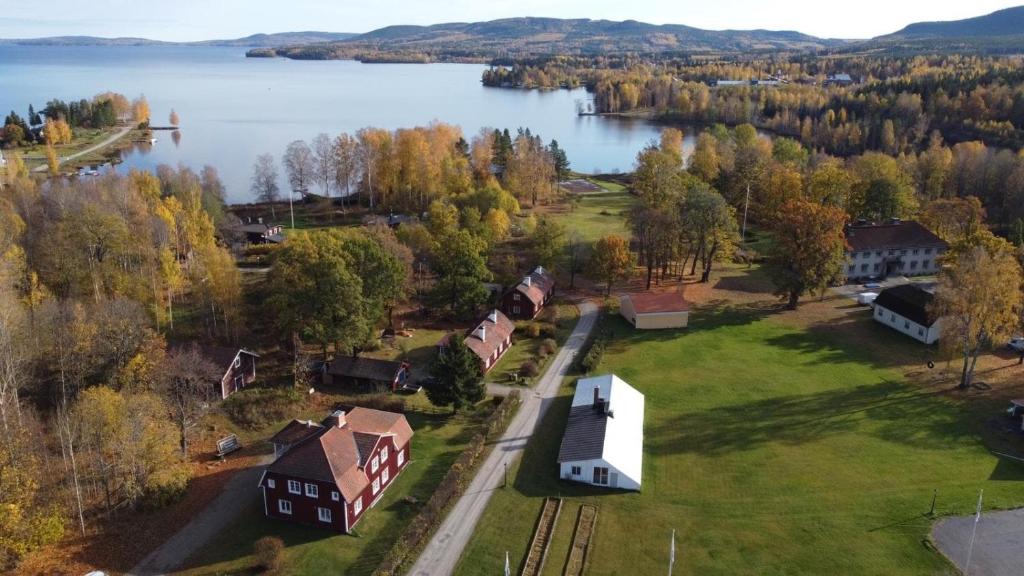 an aerial view of a house next to a lake at Annexet Kilafors in Kilafors