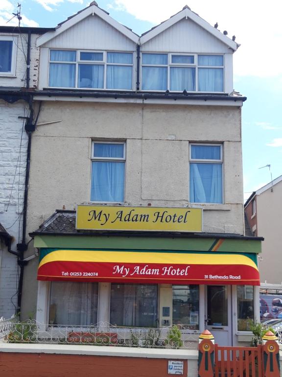 a building with a sign that reads my alham hotel at My Adam Hotel in Blackpool